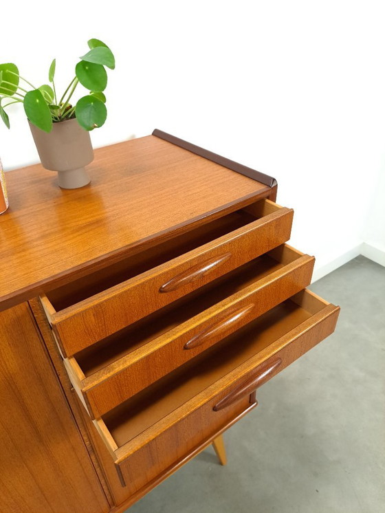 Image 1 of Armadio in teak con gambe inclinate e cassetti dalla Svezia