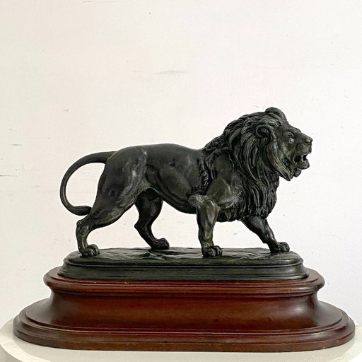 Sculpture en bronze d'un lion marchant, par Édouard Paul DELABRIERRE (1829-1912)