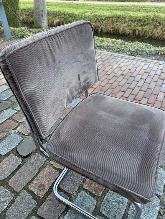 Image 1 of 8 sillas de tela acanalada pura con estructura tubular cromada