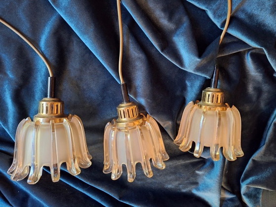 Image 1 of Set van 3 Doria hanglampen van messing en amberkleurig mat glas, jaren 1960