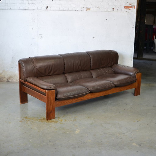 1x 3 seat leather couch in wooden frame