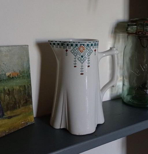 Pichet Art Deco en Terre de Fer Longwy 1911
