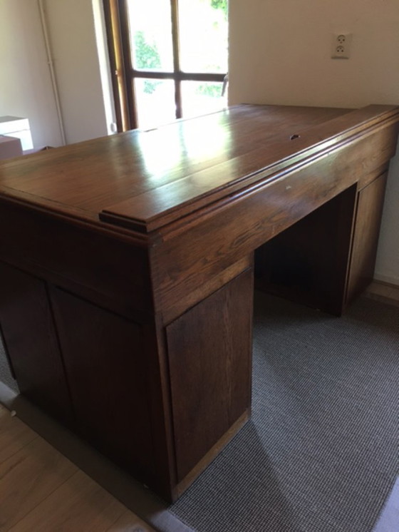 Image 1 of Eiken bureau met in/uitschuifbaar bovenblad