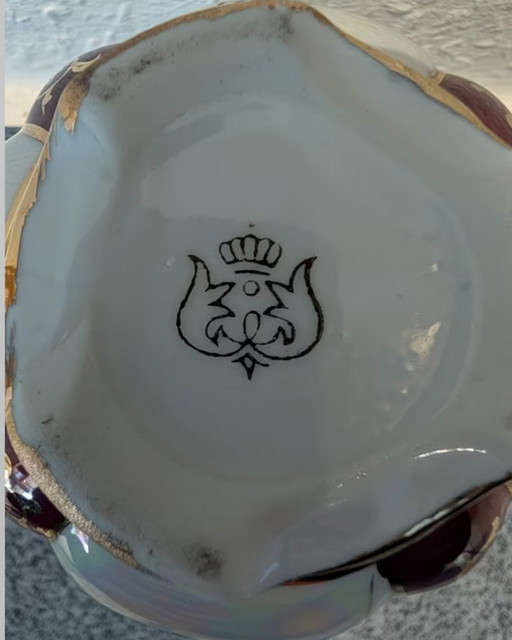 Antica lampada a olio in miniatura in porcellana della manifattura Oscar Schlegelmilch