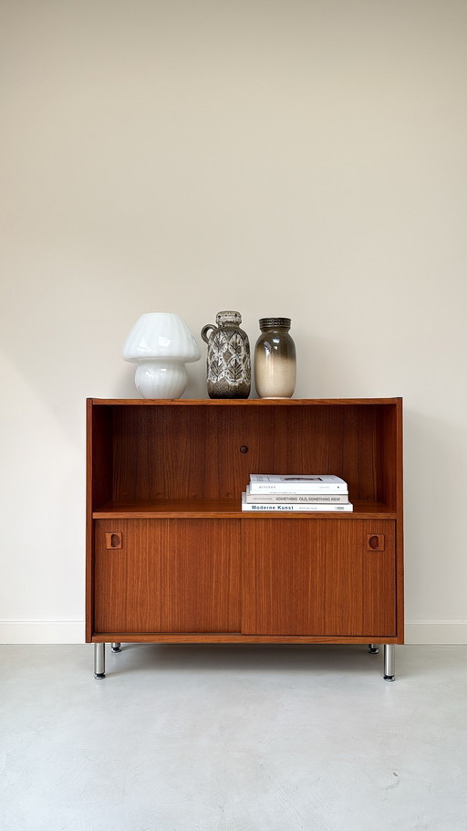 Vintage wooden cabinet with sliding doors