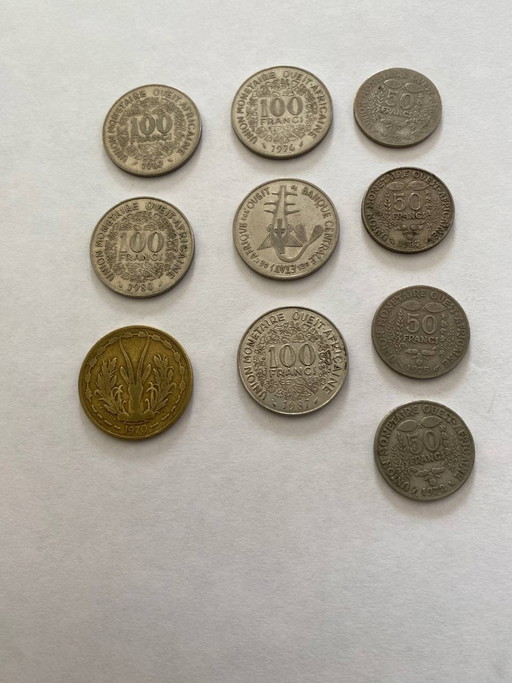 Lot of 9 old West African coins – CFA Francs – decoratieve objecten