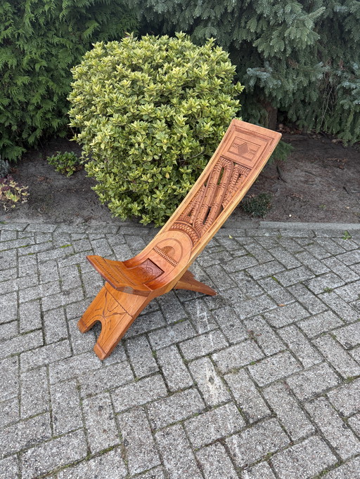 Houten vouwstoel vintage handgesneden 