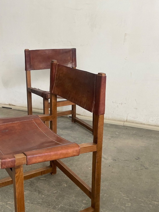 Image 1 of Een paar vintage leren stoelen