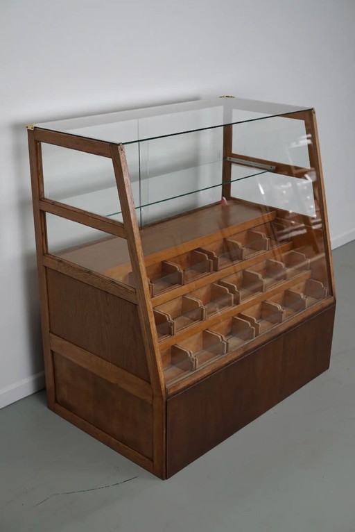 Antique Spanish haberdashery cabinet / shop counter in beech and oak, 1950s