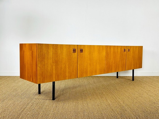 Image 1 of Minimalist Scandinavian sideboard in teak with black metal legs, 1960