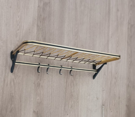Distinctive 1950s string coat rack – Metal, Plastic (photo 9 of 10)
