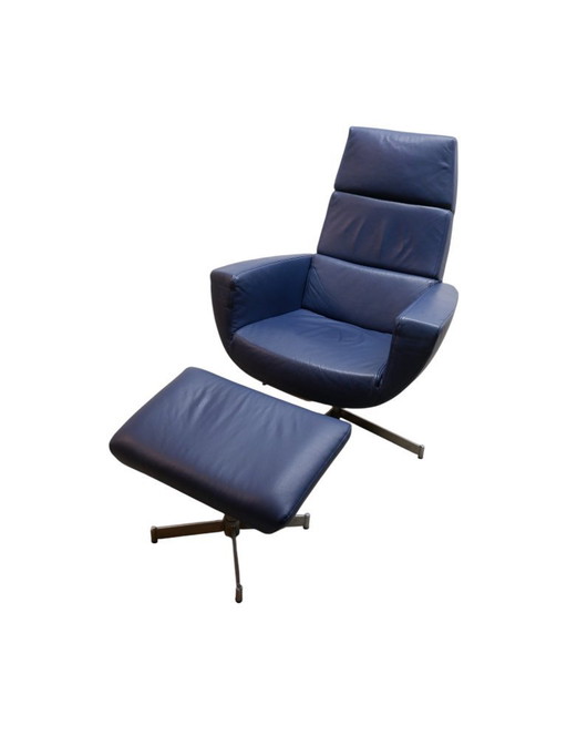 Fauteuil en cuir avec ottoman