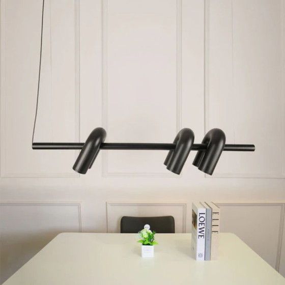 Image 1 of Lámpara de araña de comedor Cirkus con un diseño tubular arquitectónico moderno