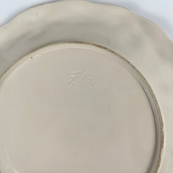 Image 1 of Plato antiguo de loza con motivo de cerezas, firmado "FG", siglo XX.