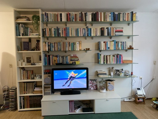 Boekenwand met tv meubel combinatie