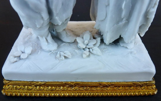 Image 1 of Luxury sponge porcelain figurine with gold leaf finish.