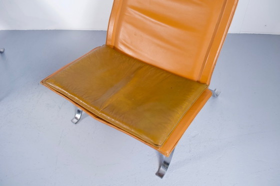 Image 1 of IMPONENTE COPPIA DI POLTRONE IN PELLE E ACCIAIO DEGLI ANNI '60