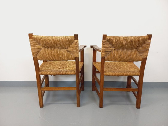 Image 1 of Suite van 2 vintage Brutalistische fauteuils in eiken en stro uit de jaren 60