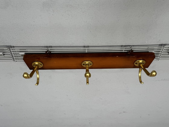 Image 1 of Appendiabiti vintage con ganci dorati - eleganza e carattere