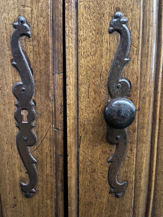 Image 1 of A very small rustic walnut sideboard
