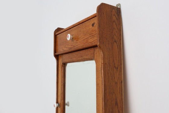 Image 1 of Art Deco houten wandkast met spiegeldeur en 2 laden, Frankrijk ca. 1900