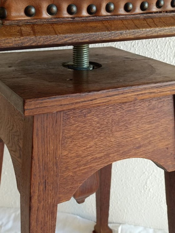 Image 1 of Antica sedia da pianoforte regolabile. Scuola di Amsterdam