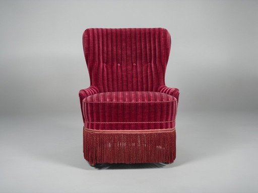 Fauteuil danois des années 1960, revêtement d'origine en velours rouge rayé.