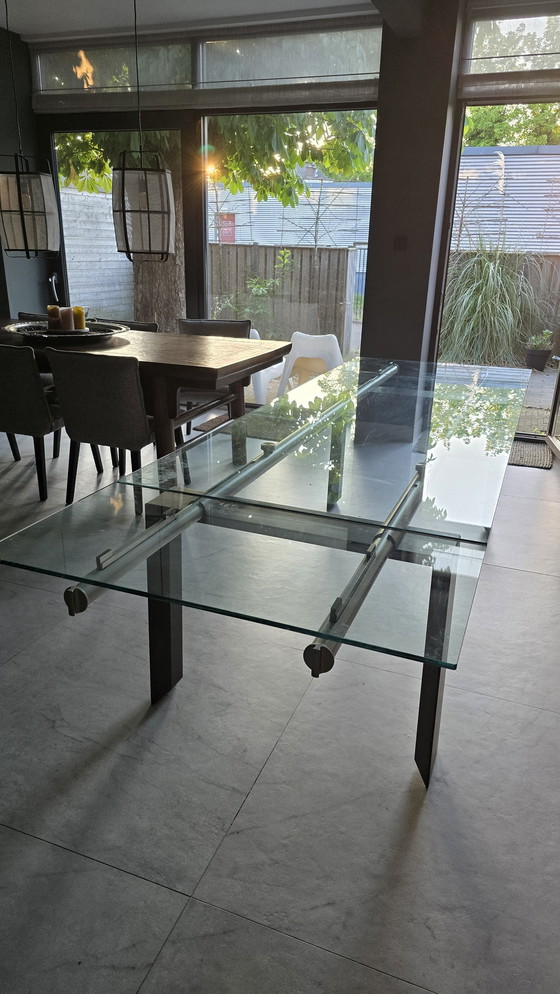 Image 1 of Tavolo da pranzo allungabile dal design vintage | Vetro, legno e metallo (circa 2000)