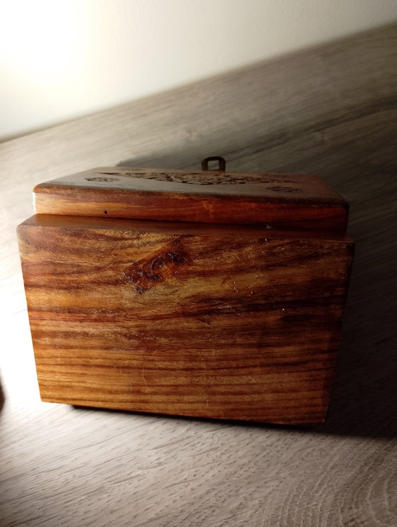 Image 1 of Hand-carved, handcrafted jewelry storage box made of sheesman wood from India