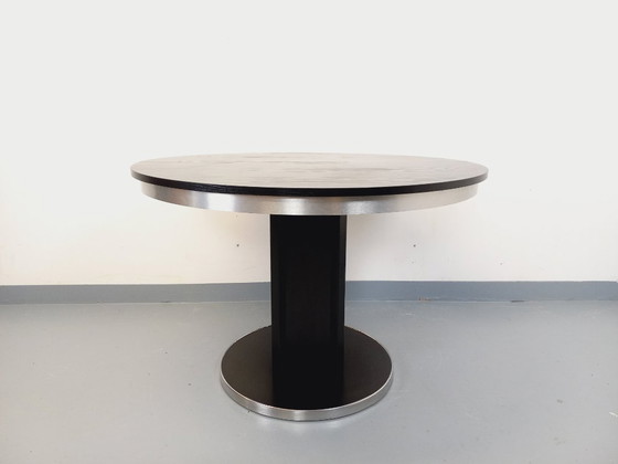Image 1 of Table ronde de repas vintage en mélaminé esprit bois noir et métal chromé style Space Age / Diner des années 70 avec rallonge in