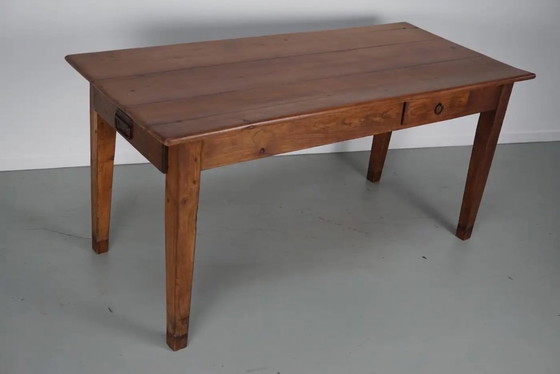 Image 1 of Early 20th-century French rustic country dining table made of fruitwood