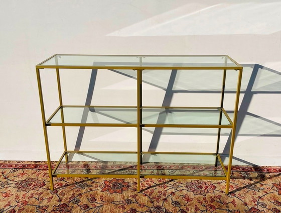 Image 1 of Contemporary gold-colored rack
