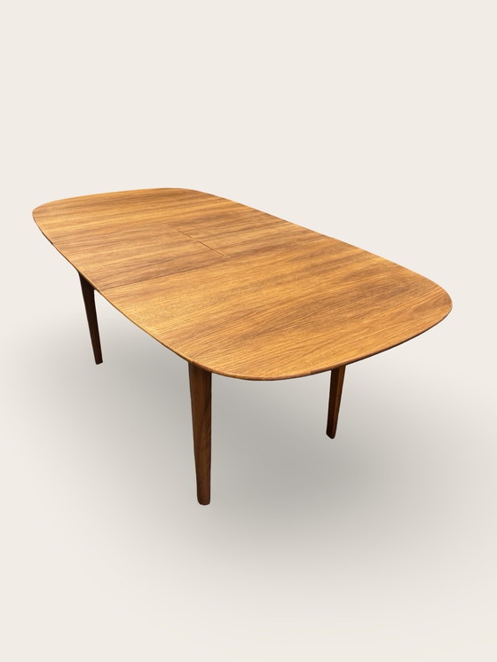 Image 1 of Extendable oval dining table - teak/walnut - A.A. Patijn for Zijlstra, 1950s