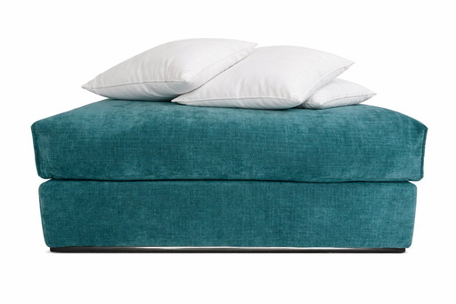 Gloednieuwe poef/hocker Melchior groen blauw