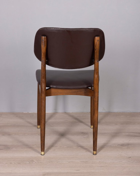 Image 1 of Set di 8 sedie vintage anni '60 in legno e pelle, disegnate da Anonima Castelli.