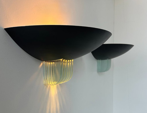 Pair of post-modernist sconces in black metal and glass, France 1980
