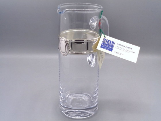 Image 1 of Karaf van geblazen glas met een band van 925 zilver.