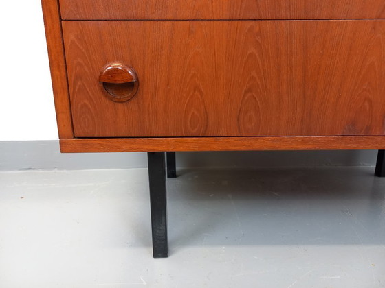 Image 1 of Vintage Scandinavische ladekast in teakhout en zwart metaal uit de jaren 60