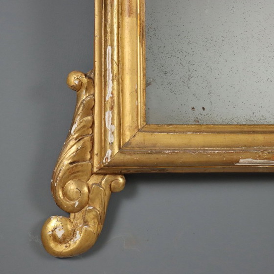Image 1 of Miroir avec cadre en bois sculpté et doré