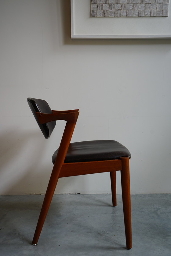 Image 1 of 6 Kai Kristiansen stoelen | Model 42 | Teak Leder patina