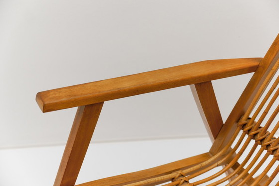 Image 1 of Sedia a dondolo in legno e rattan della Deutsche Werkstätten Hellerau, anni '60