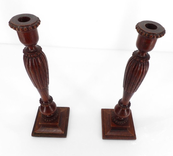 Image 1 of Pair of neoclassical carved and turned wood candlesticks, France, circa 1950