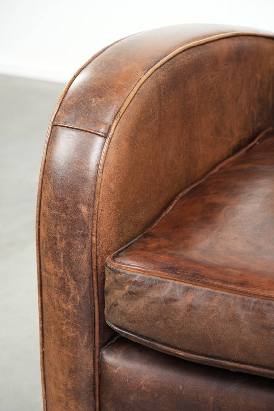 Image 1 of Sessel aus Schaffellleder mit wunderschönem, zeitlosem Design und herrlich warmen Farben
