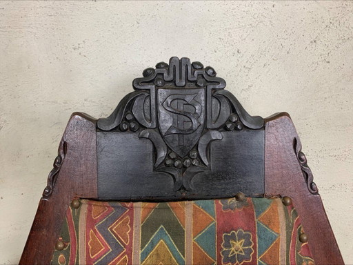 Attributed to Jac. Van Den Bosch, an Amsterdam School armchair with foot warmer