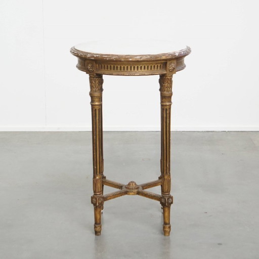 Antique French round gold side table with a marble top