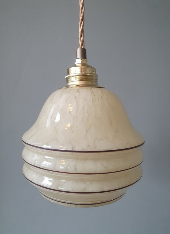 Image 1 of Vintage hanglamp - amberkleurig glas met spots en goudkleurige biezen.