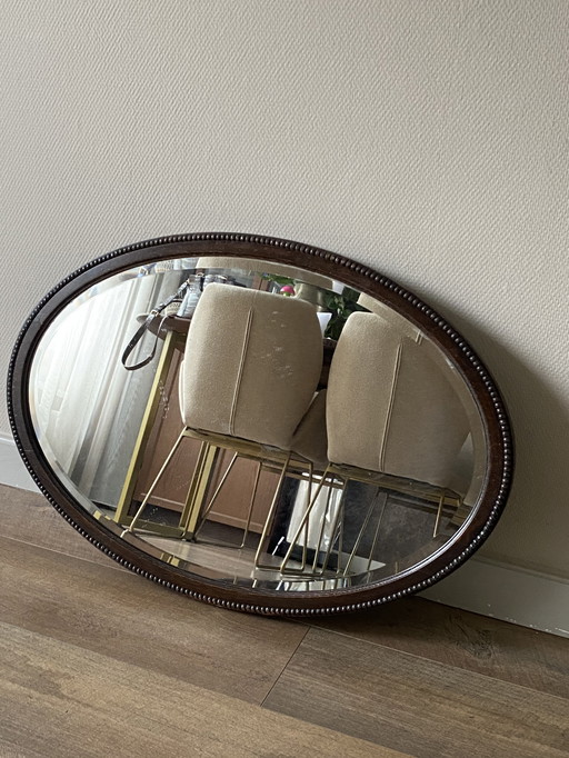 Large oval wooden antique mirror