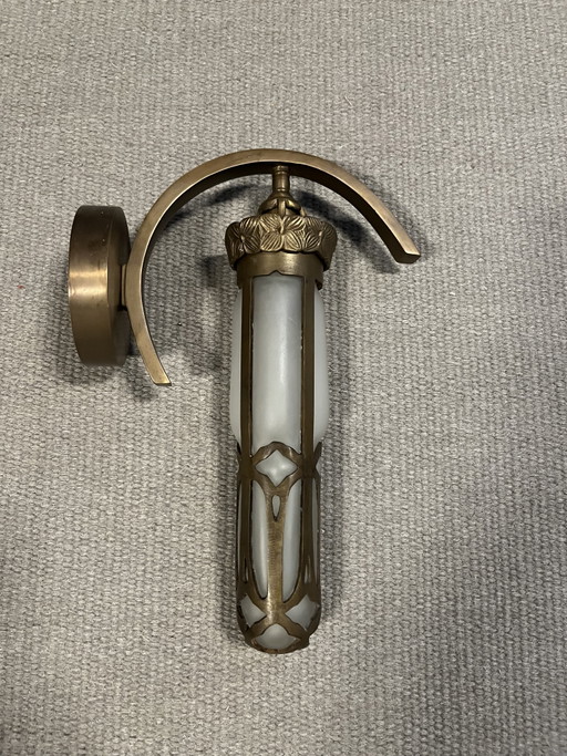 2 wall lamps of bronze and glass. Made by artist Vladimir.
