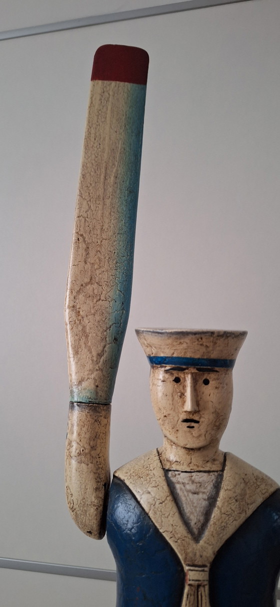 Image 1 of Antieke matroos met roeispanen als armen