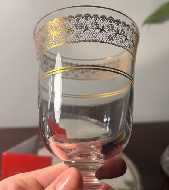 Image 1 of application Baccarat en or sur verre cristal